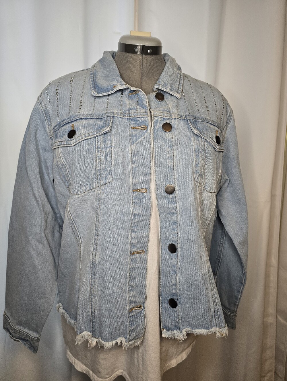 Light Blue Denim Jacket with Distressed Hem And Rhinestones